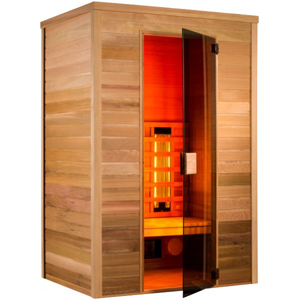 Una sauna in legno con una porta in vetro e una luce rossa all'interno