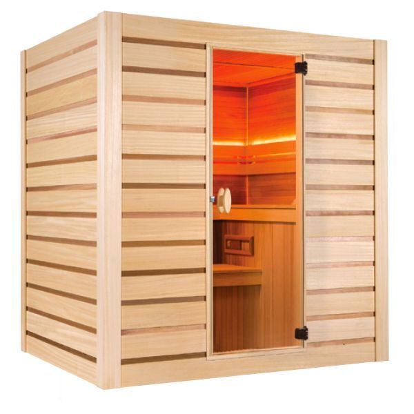 Una sauna in legno con una luce rossa che esce dalla porta