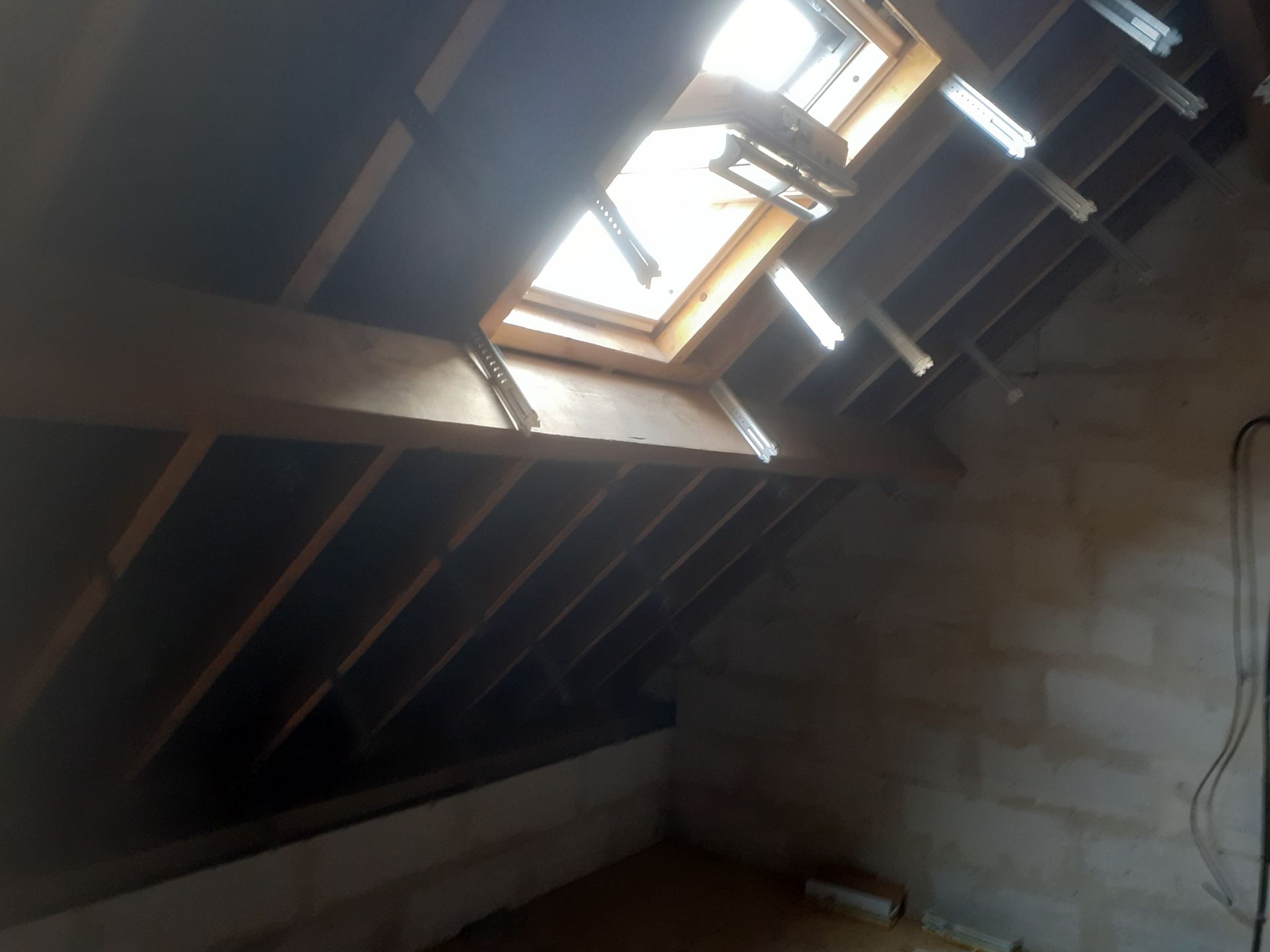 Phase de préparation de la sous-couche d'isolation de rampants 1