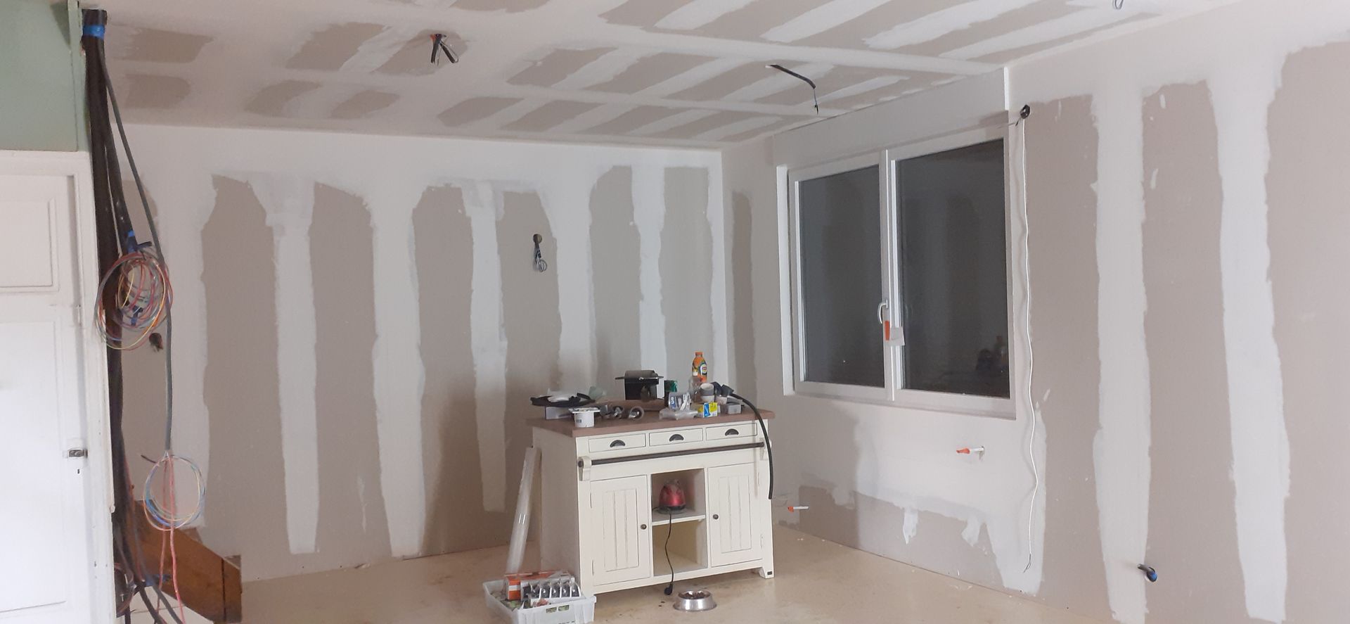 Isolation des murs avec pose de plaques de plâtre 14