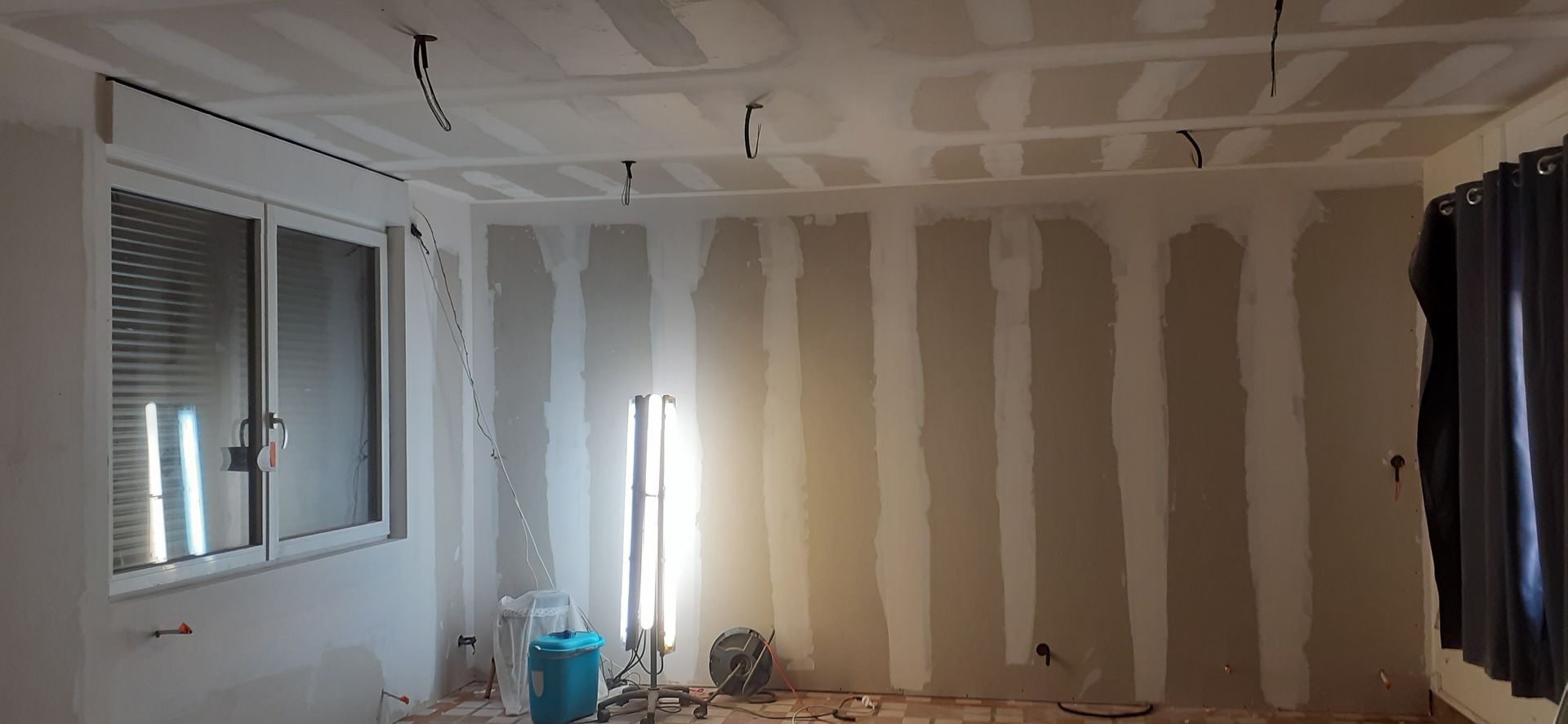 Isolation des murs avec pose de plaques de plâtre 12