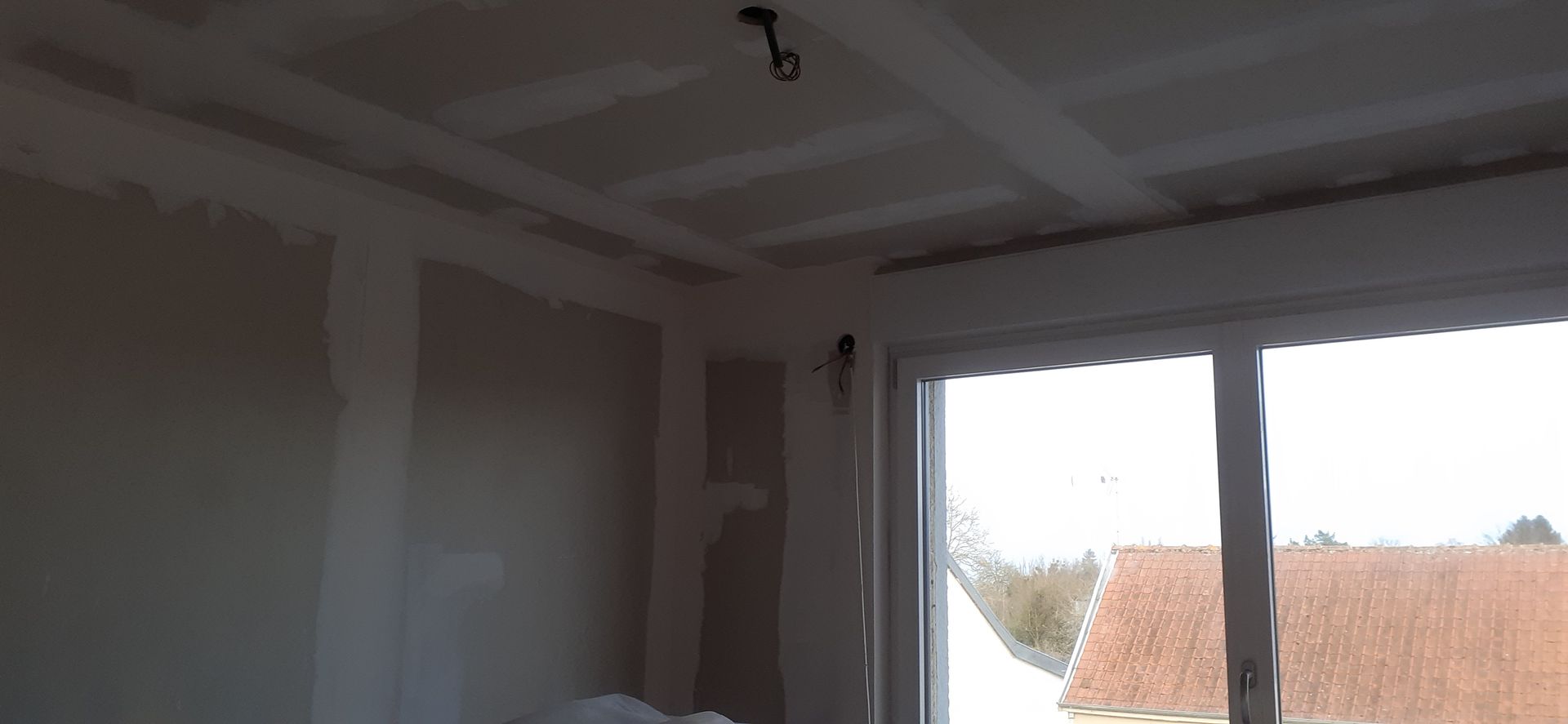 Isolation des murs avec pose de plaques de plâtre 8