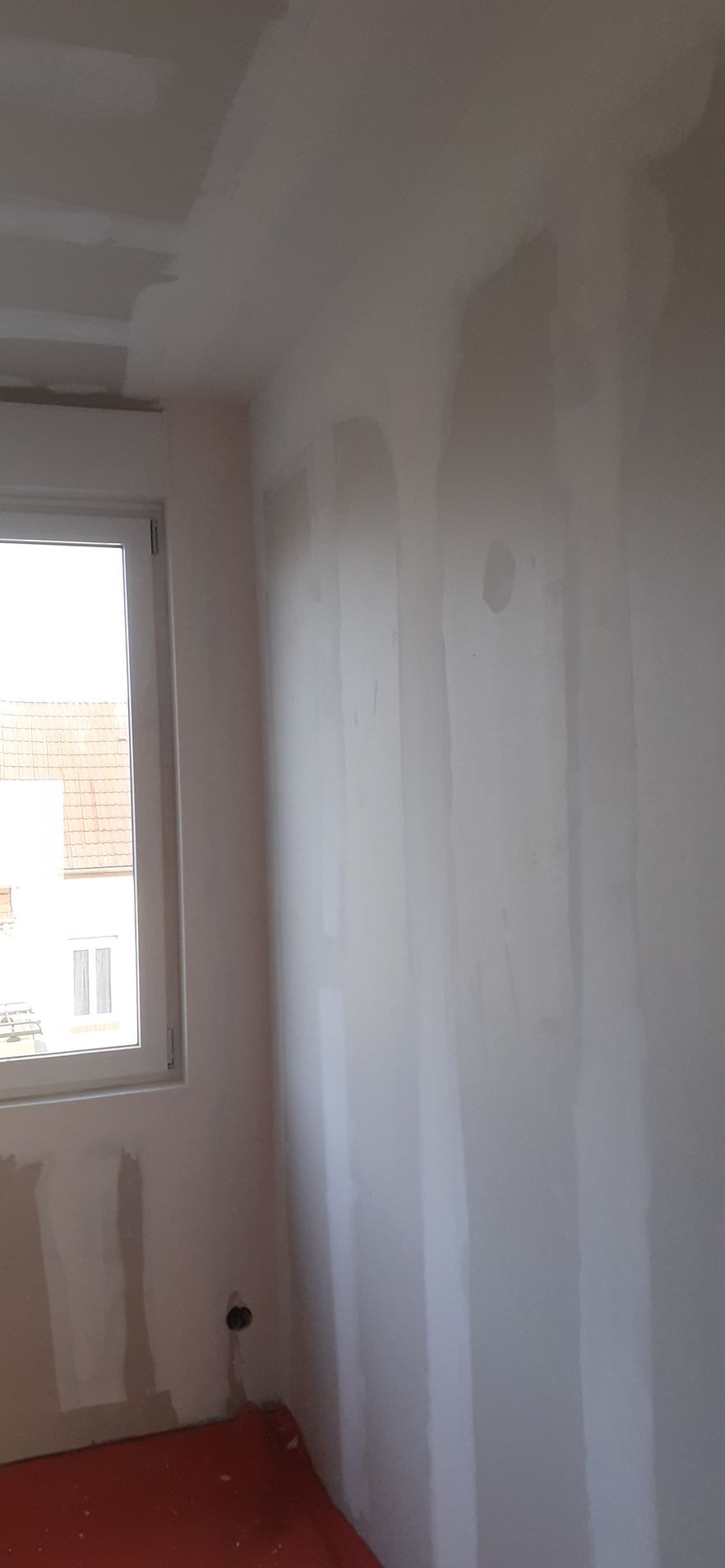 Isolation des murs avec pose de plaques de plâtre 7