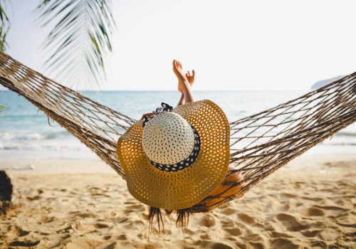 woman in hammock on the beach