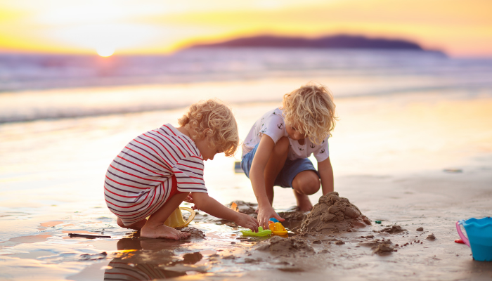 kids digging in the sand at Sombrero beach near marathon florida