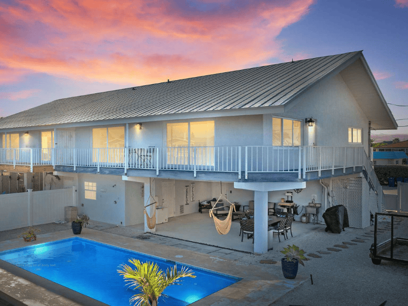 Couple laughing and eating ice cream cones outdoors in the florida keys