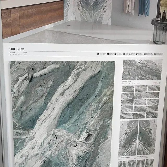 Una imagen de un azulejo de mármol en un baño.