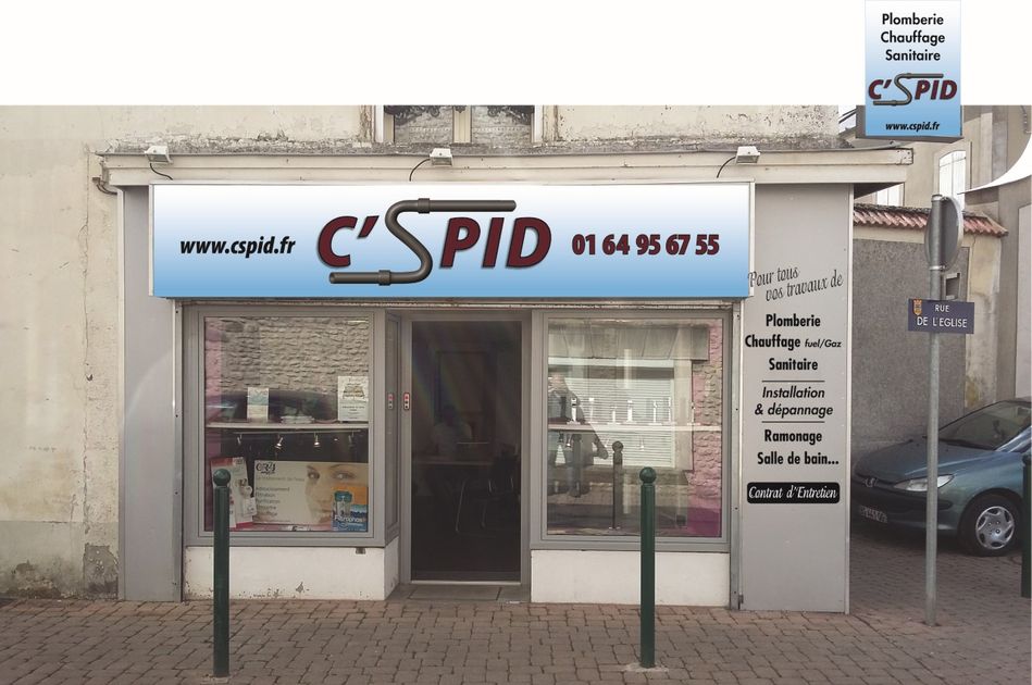 Vue de face d'une boutique C'Spid avec auvent bleu et entrée vitrée donnant sur une rue.