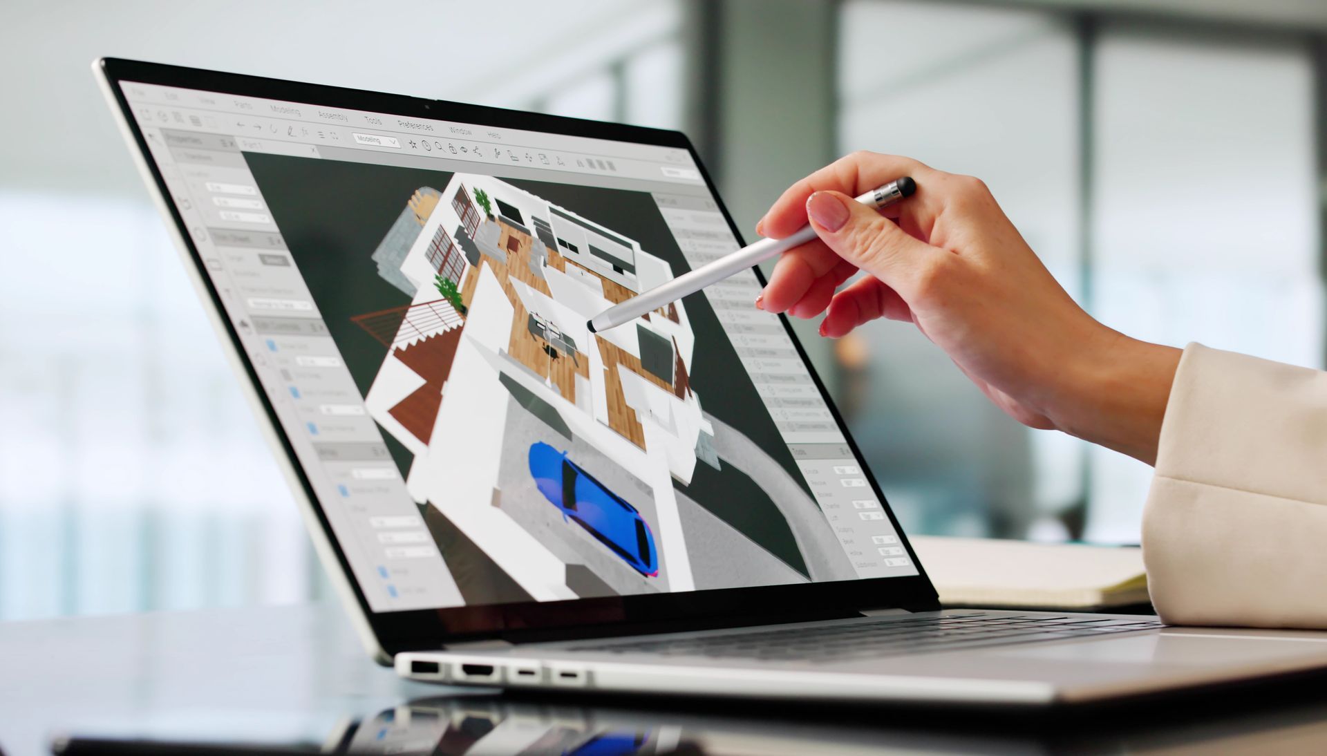 Un architecte d'intérieur crée un plan d'étage virtuel en 3D pour l'immobilier