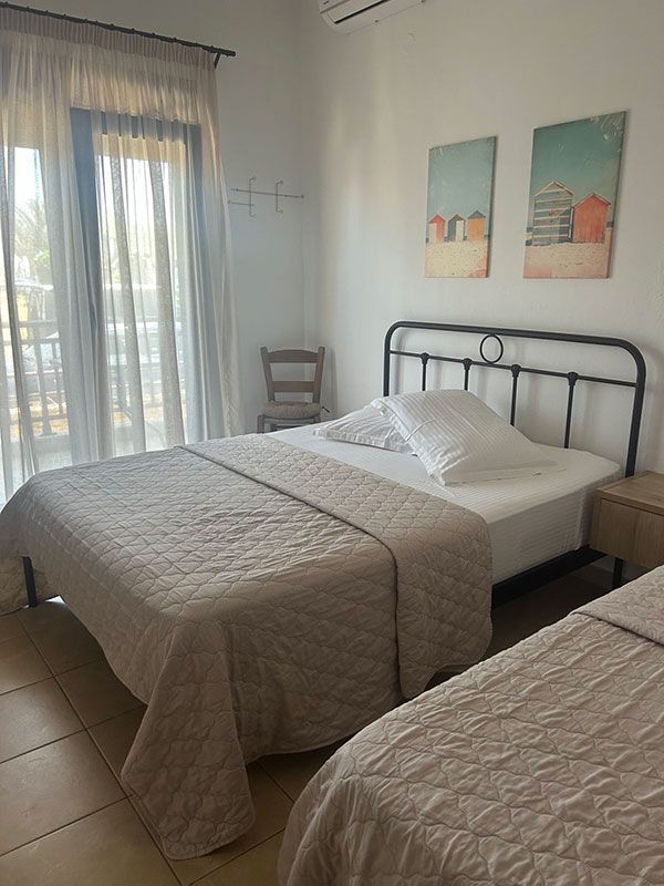 Τρίκλινο θέα θάλασσα -  Ενοικιαζόμενα Δωμάτια MARIANTHI - ANTHOULA HOUSE