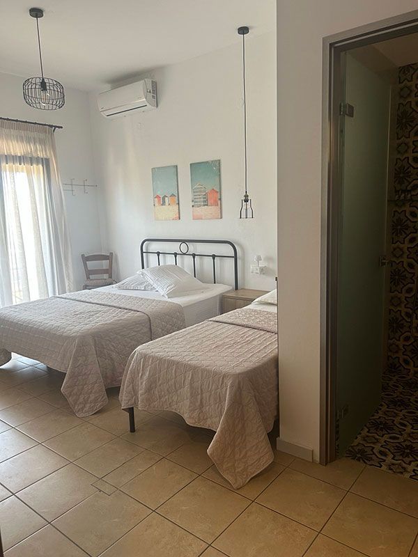 Τρίκλινο θέα θάλασσα -  Ενοικιαζόμενα Δωμάτια MARIANTHI - ANTHOULA HOUSE