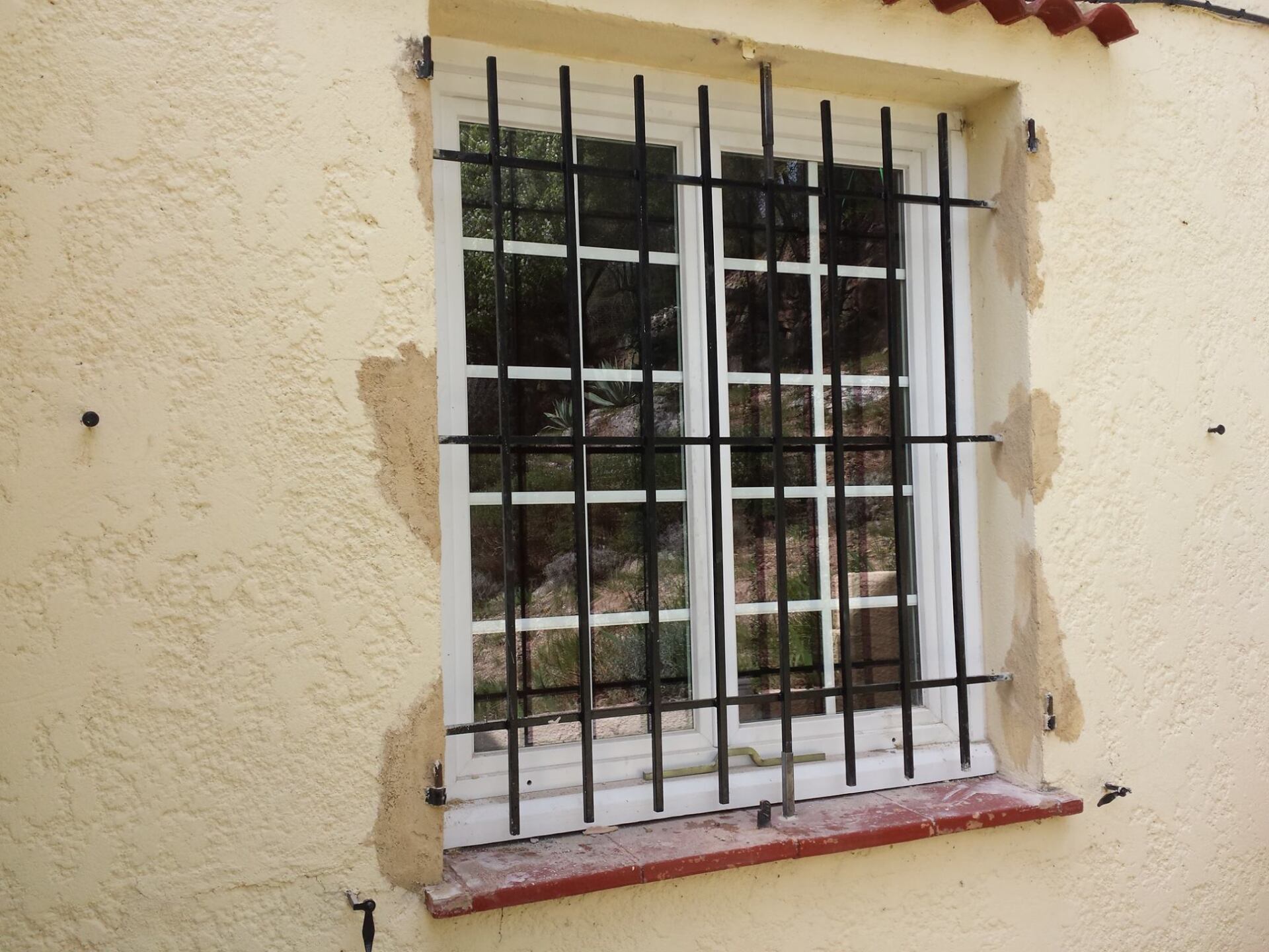 Fenêtre et barreaux