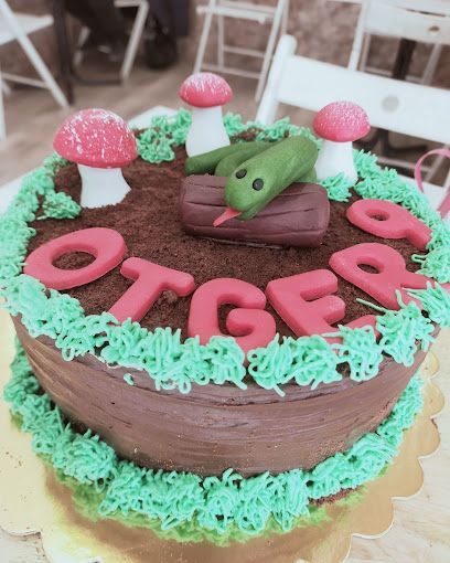 Un pastel con el nombre Otger en él
