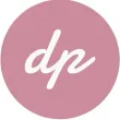 Un círculo rosa con la palabra dp escrita dentro.