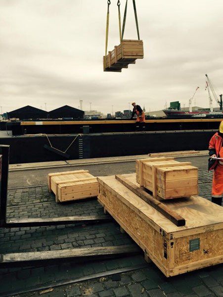 Inladen houten kisten