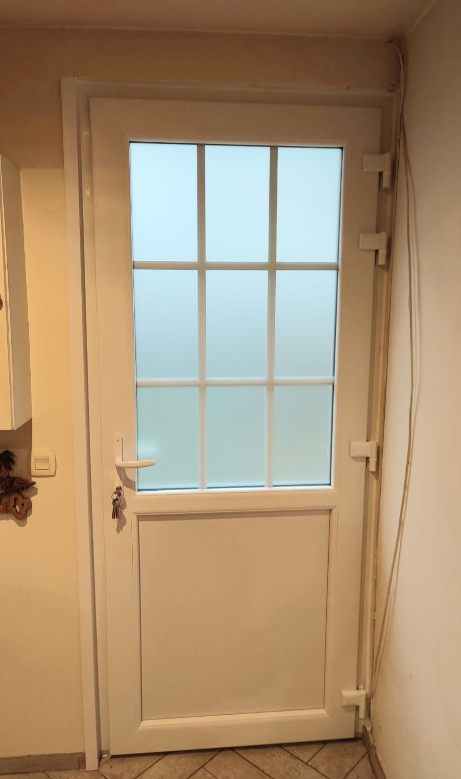 Porte-fenêtre à carreaux dépolis