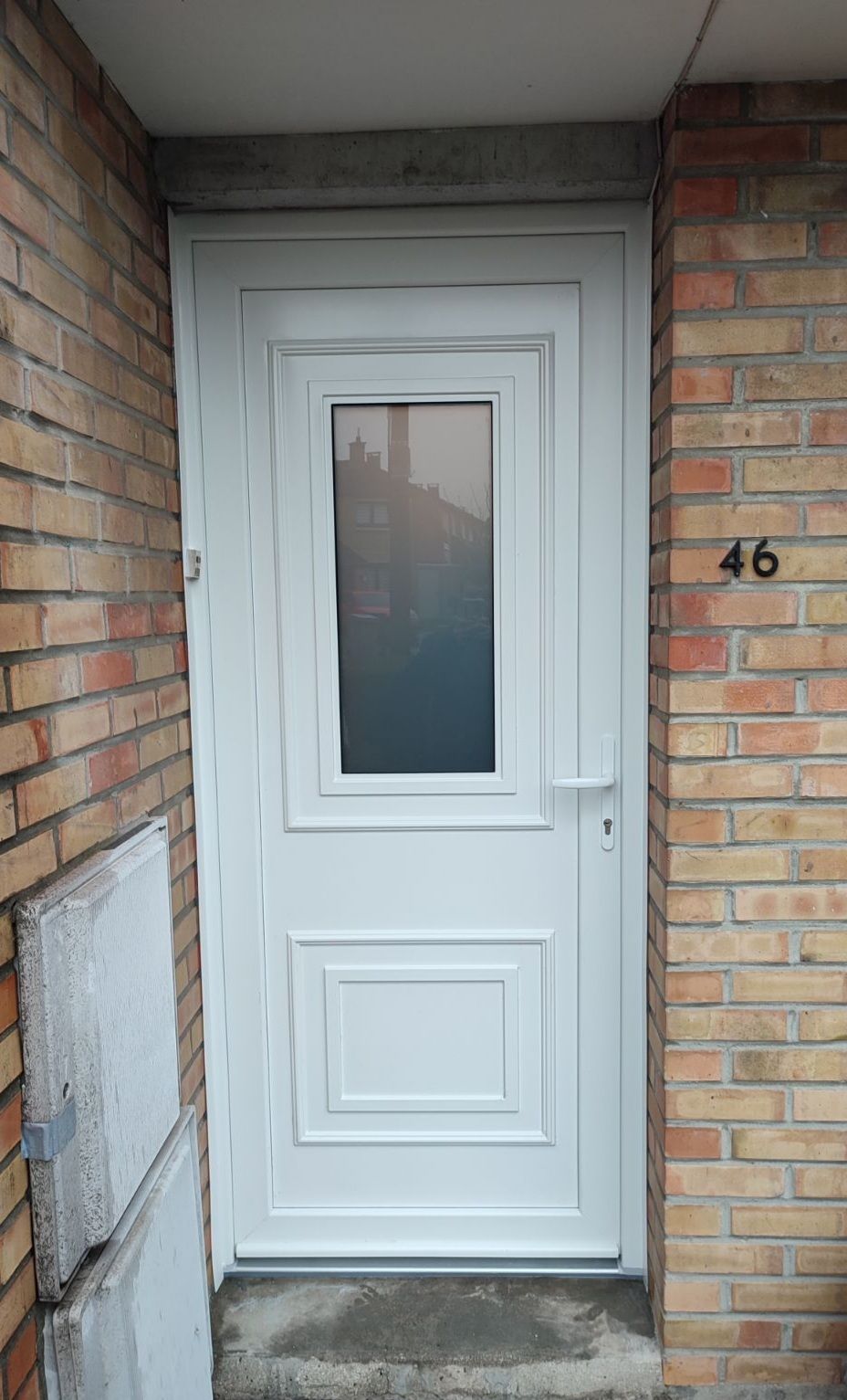 Porte d'entrée en PVC vitrée