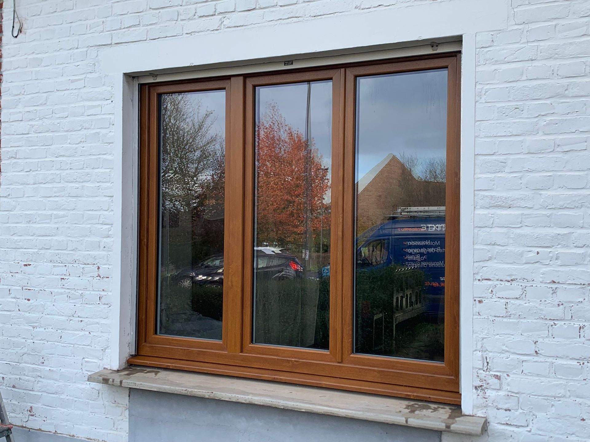 Fenêtre imitation bois à 3 battants