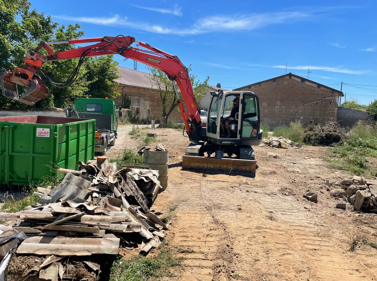 Chargement de gravat et déchet métalique avec une pelle