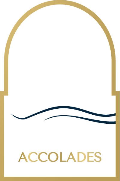 Gold-framed logo with arched top. Contains dark blue wavy lines and the word