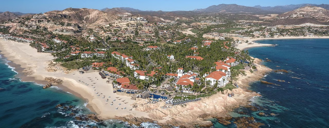 Palmilla Beach calm waters and wide sandy shore in Cabo