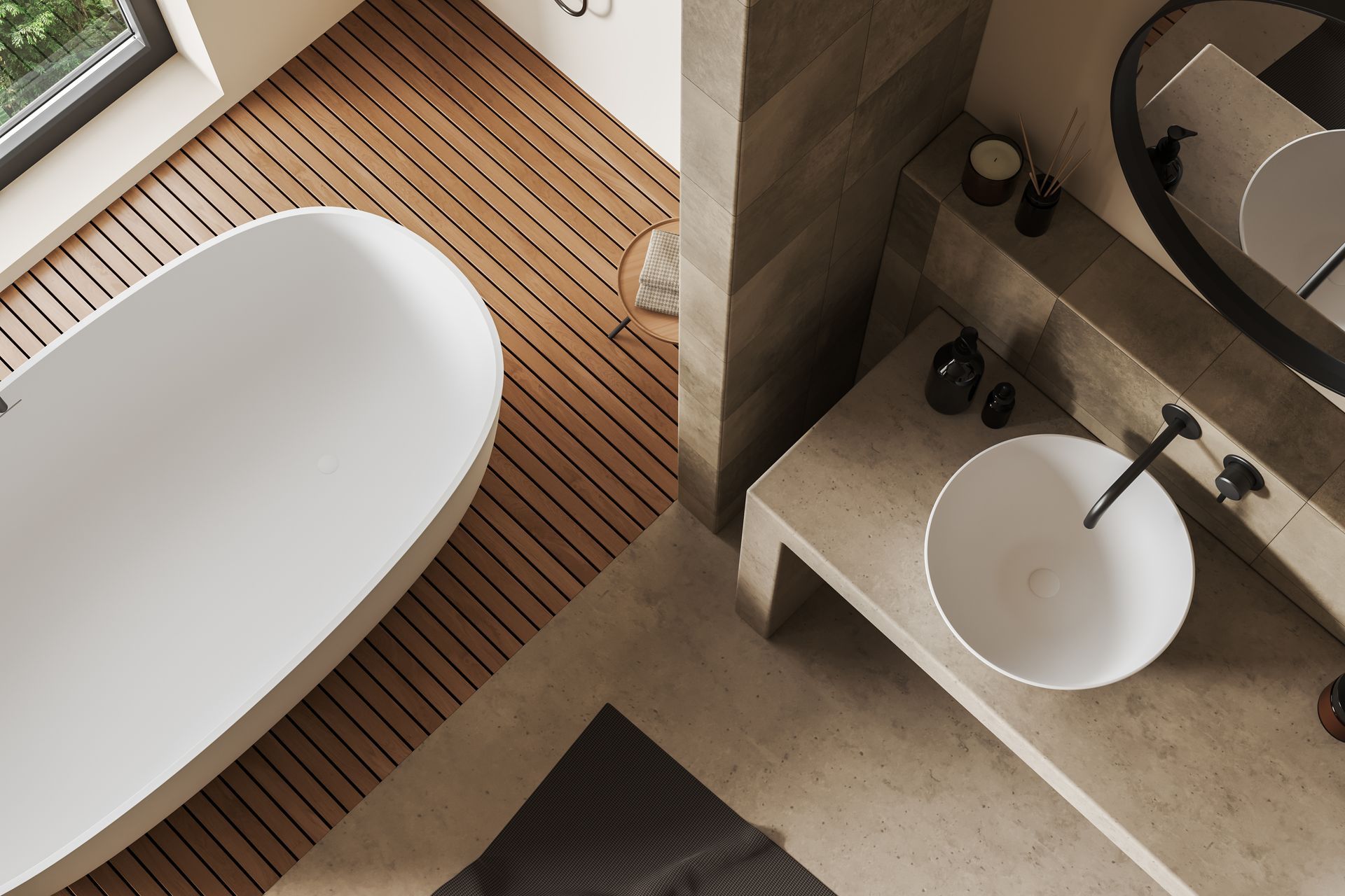 Salle de bains moderne avec baignoire îlot, meuble-lavabo en pierre, vasque et parquet.