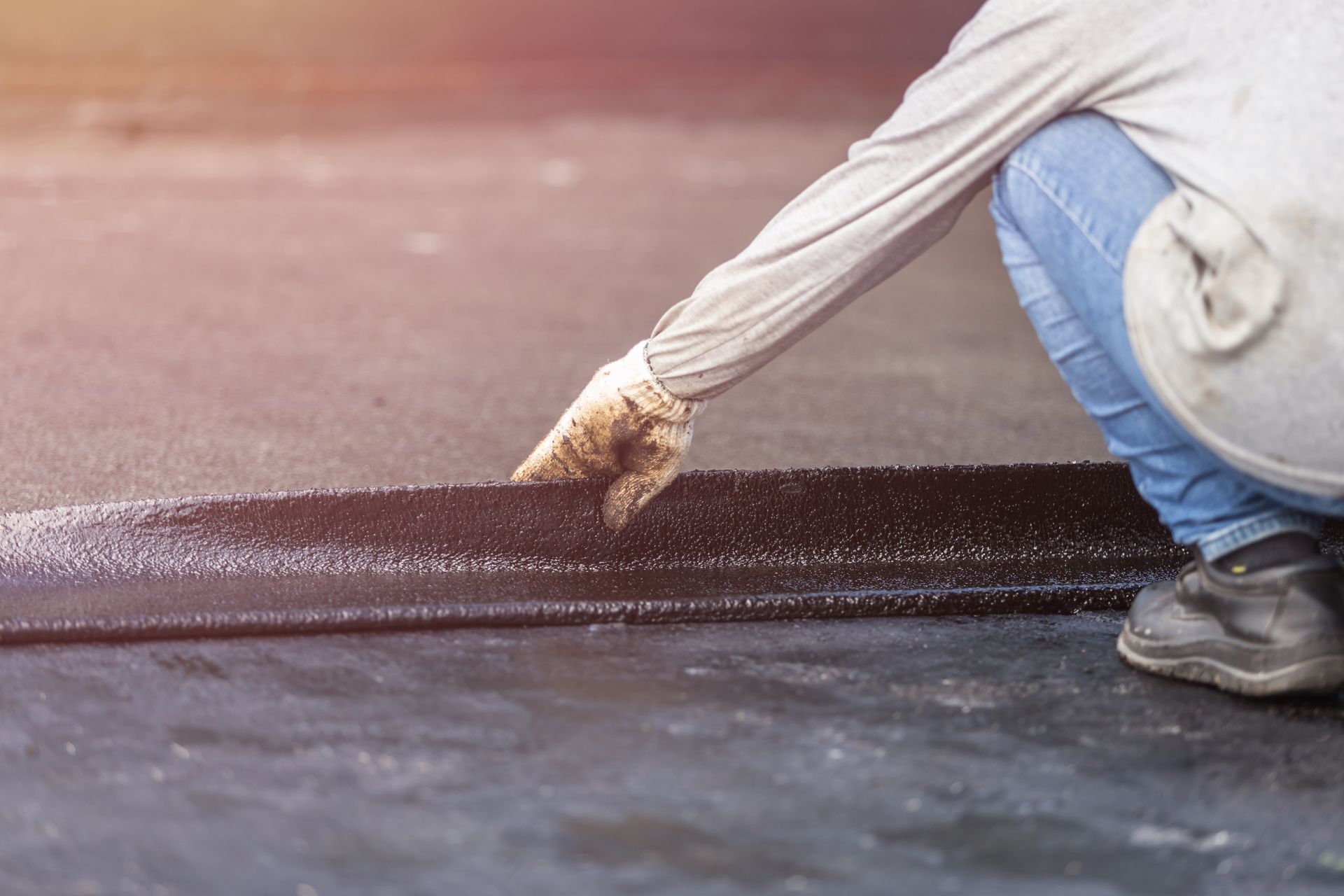 Application d'une membrane sur un toit-terrasse