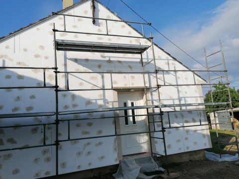 Réparation façade.