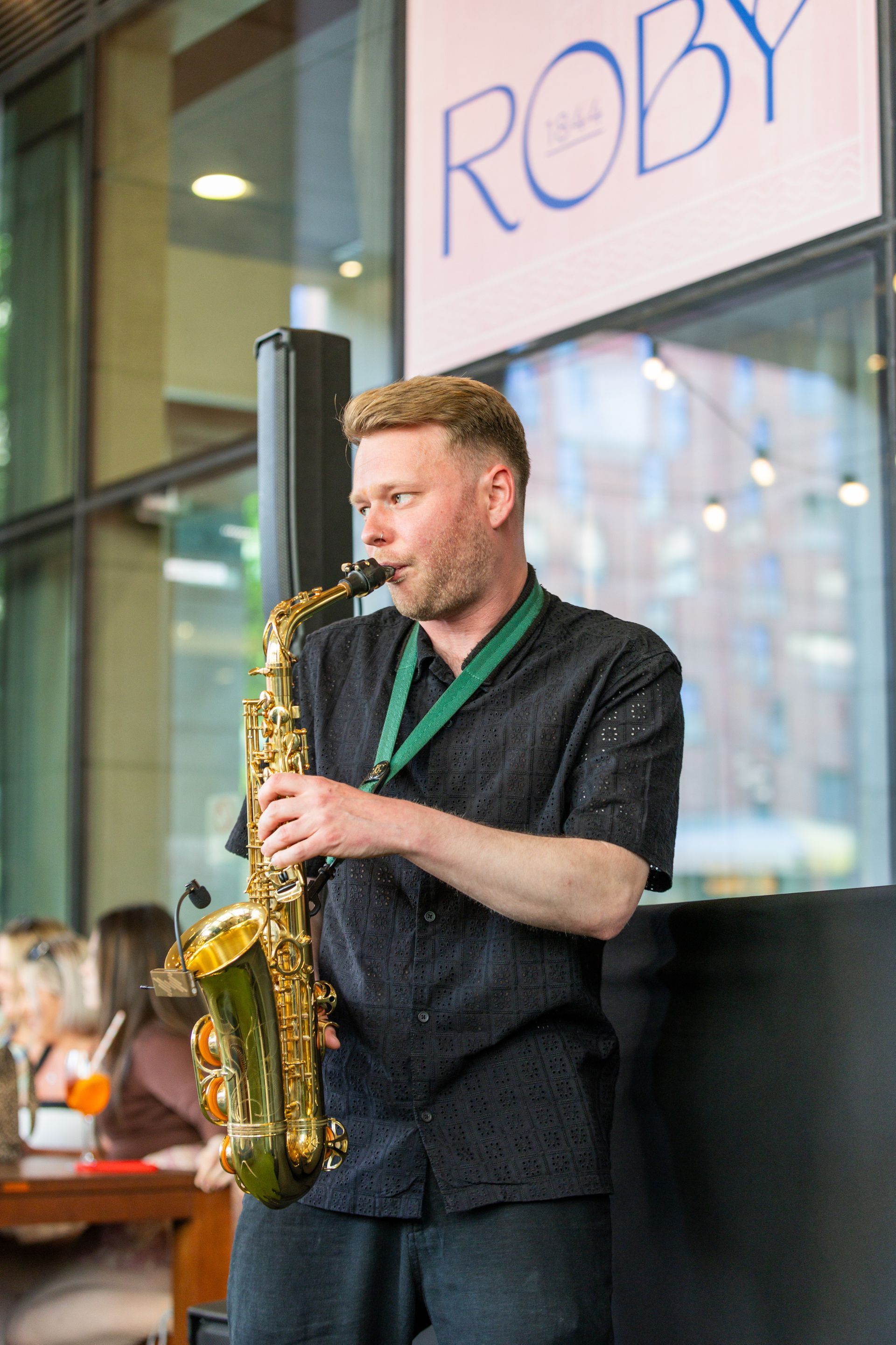 a saxophoneist with a golden saxophone