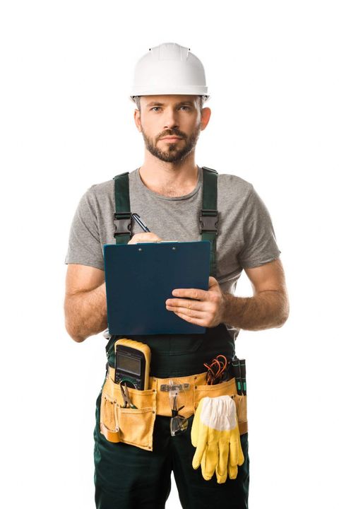 Elektriker mit Klemmbrett in der Hand, Michael Koch Elektromeister
