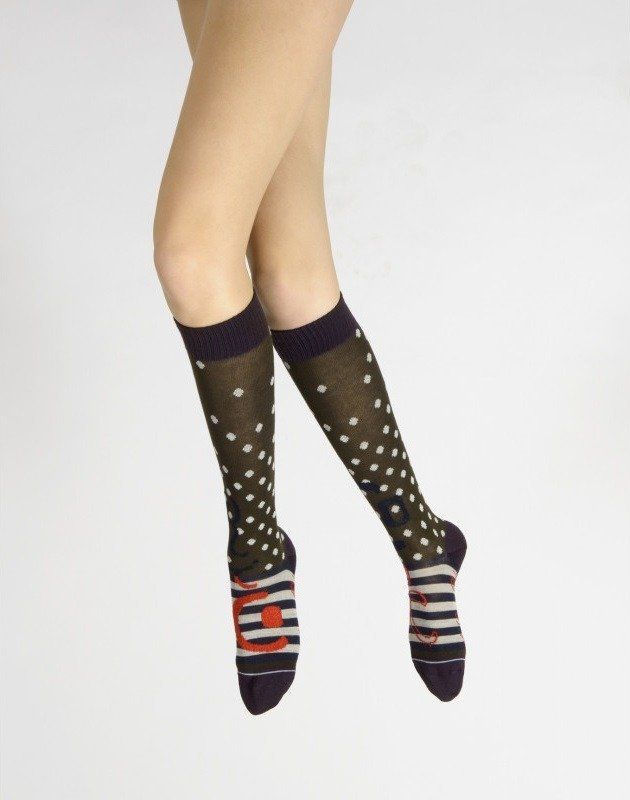 Chaussettes noires à pois blancs