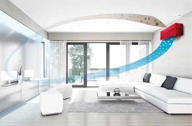 Una sala de estar con un aire acondicionado rojo colgando del techo.