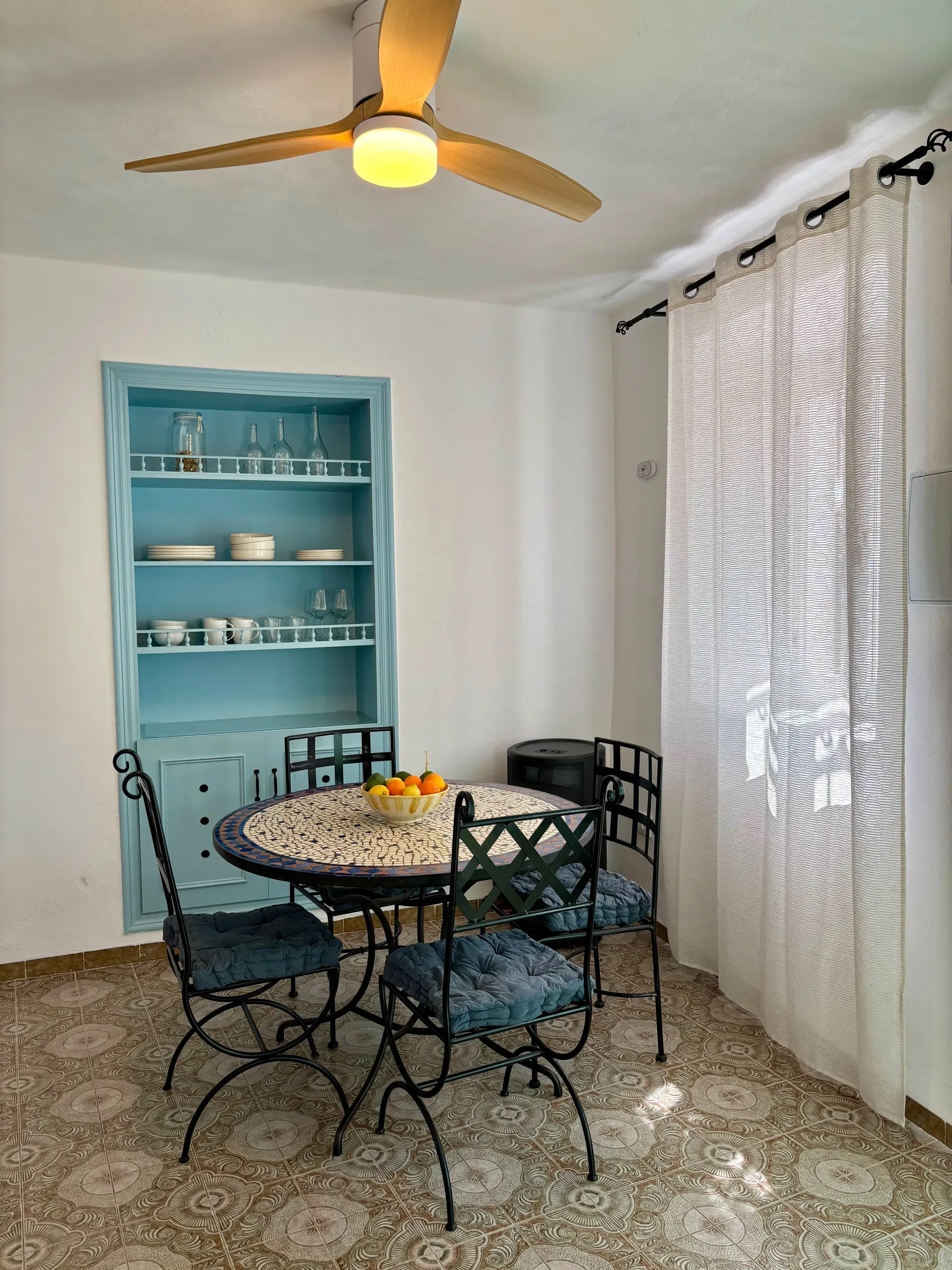 Dining area equipped with tableware, wine glasses and everything you need