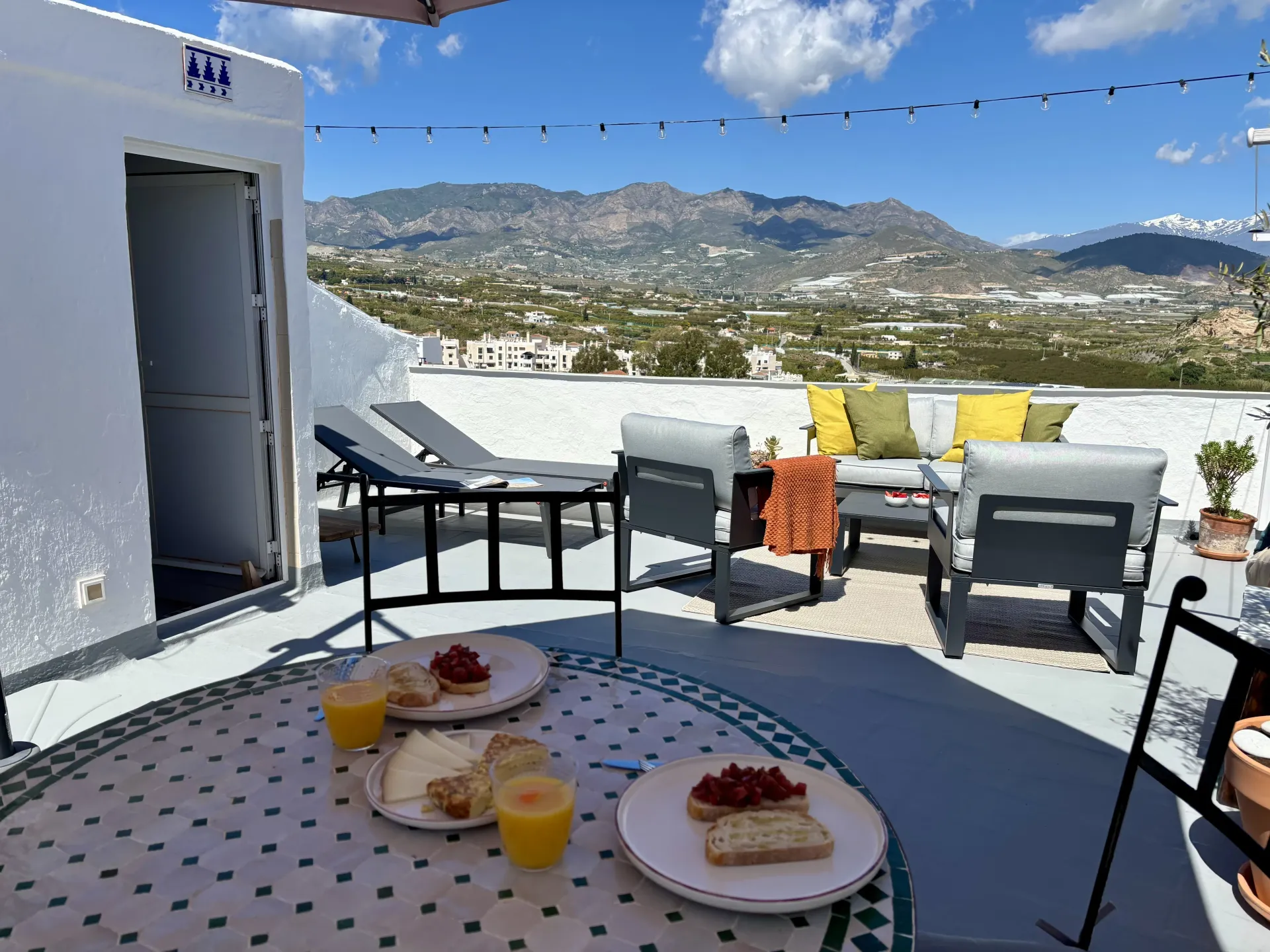 Private rooftop terrace with open mountain views at Casa La Granada in Salobreña