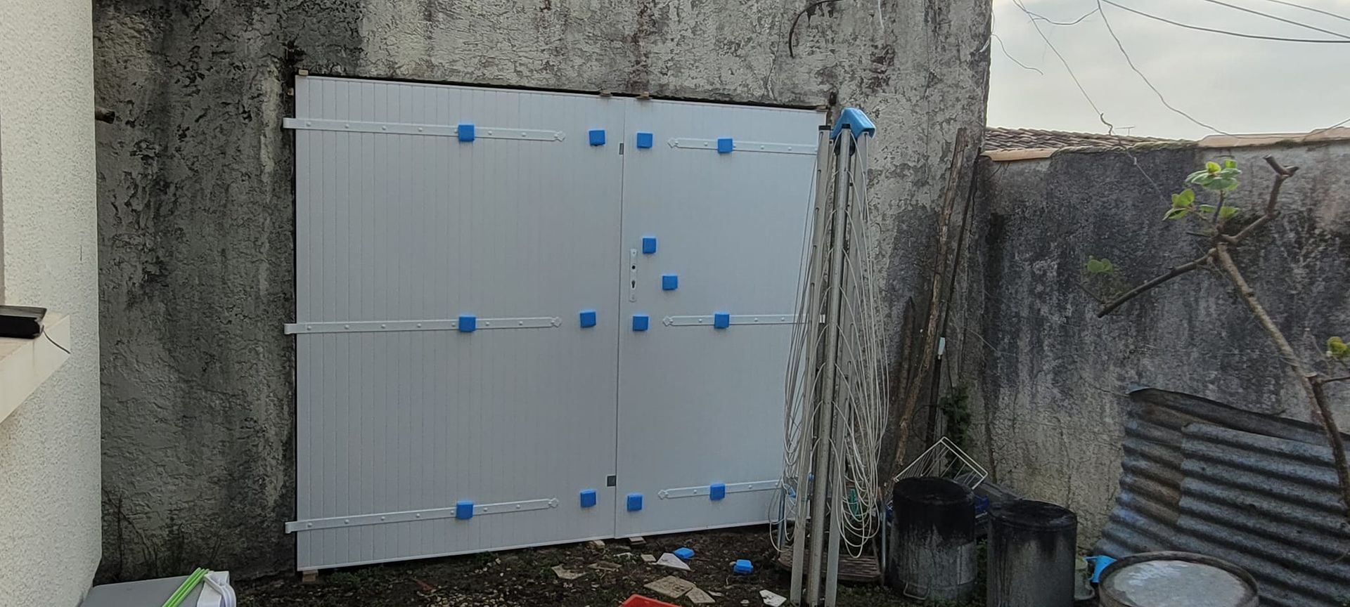 Pose d'une porte de garage