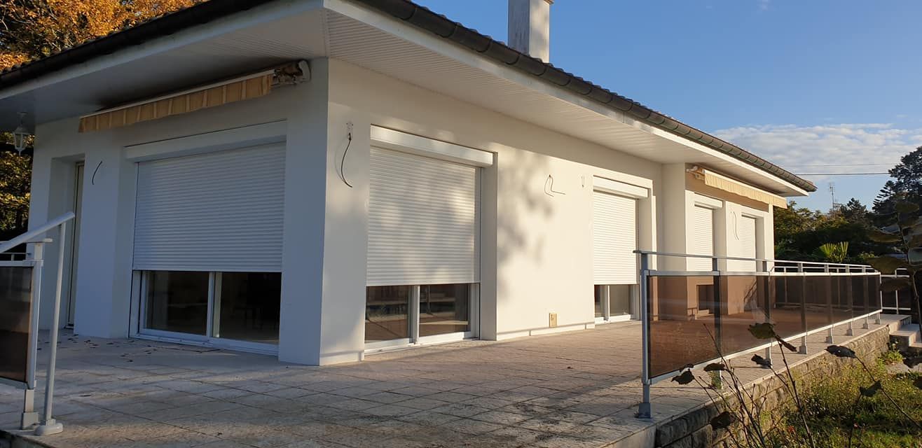 Installation de volets roulants pour une maison