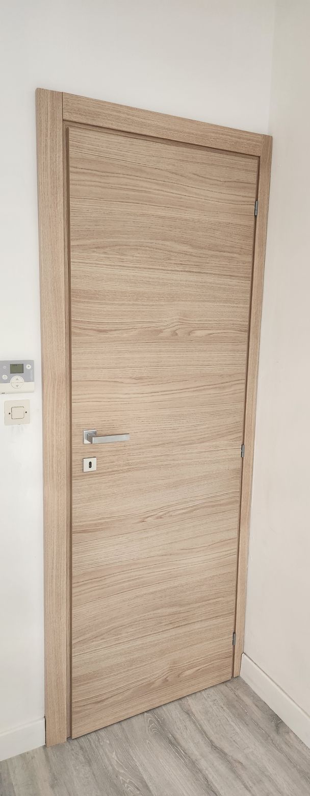 Rénovation de porte d'intérieur en bois