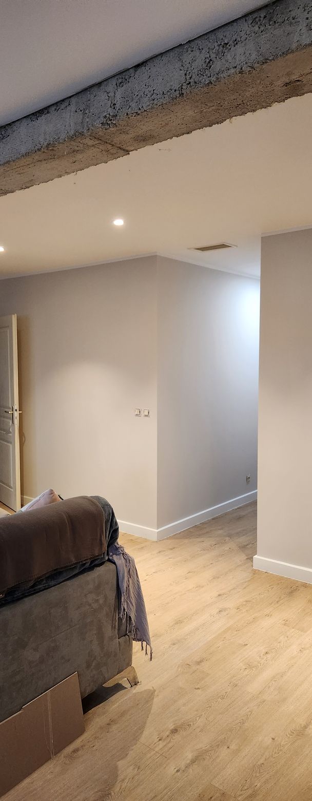 Salon avec sol en parquet