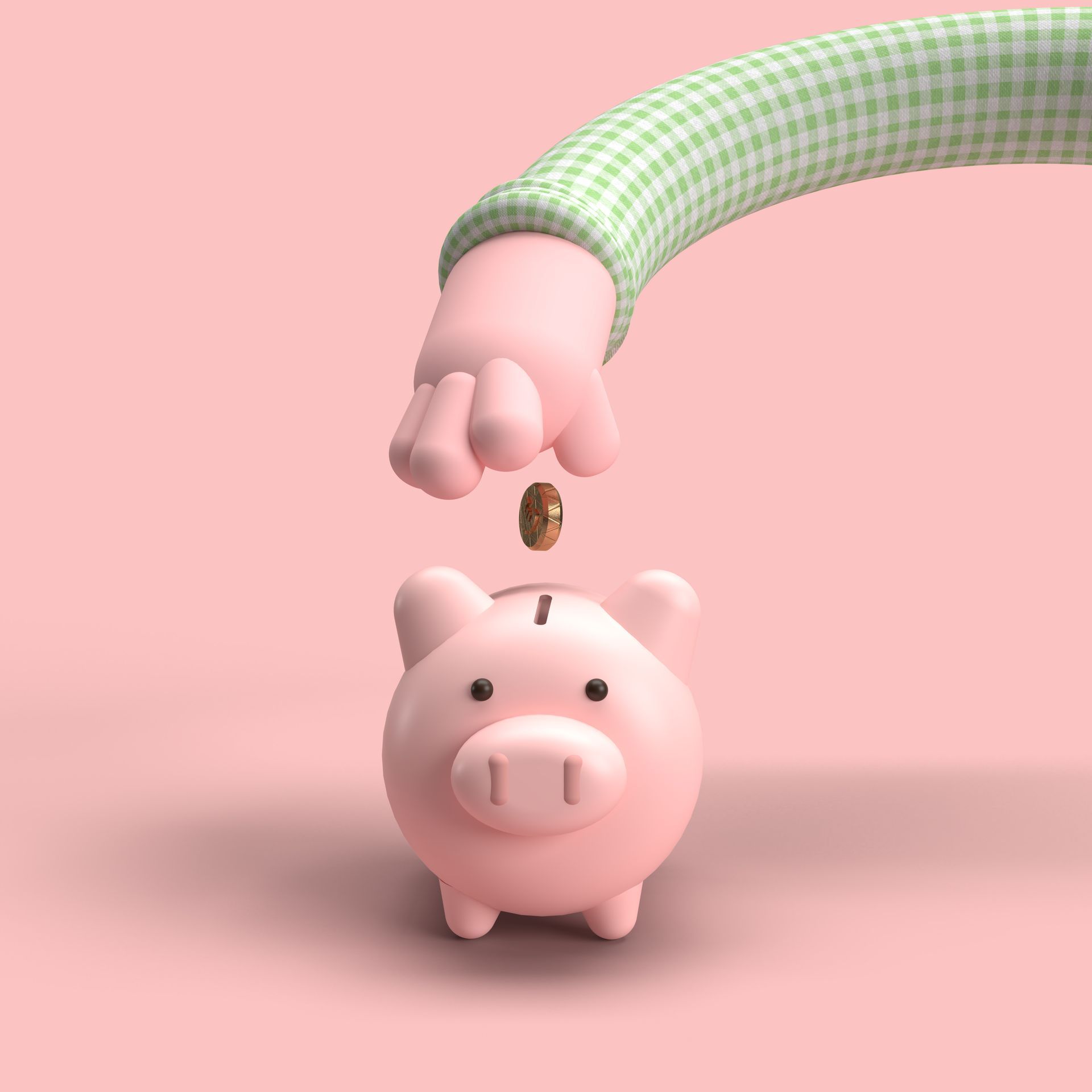 Main déposant une pièce dans une tirelire cochon