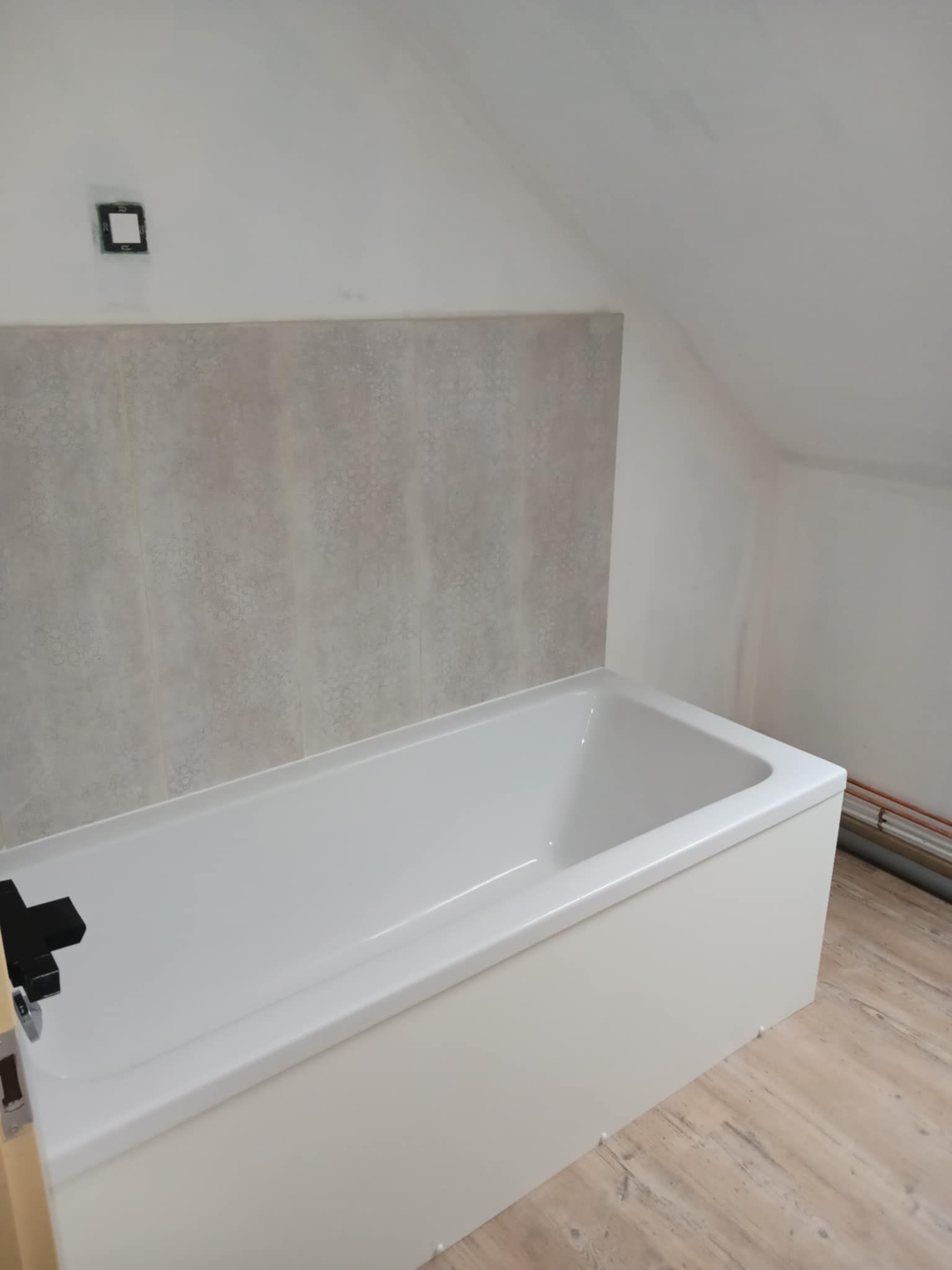 Pose d'une baignoire