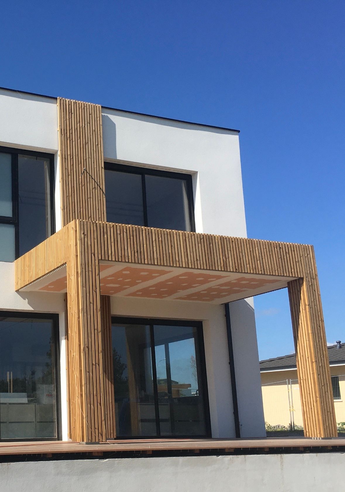 Maison avec un bardage en bois