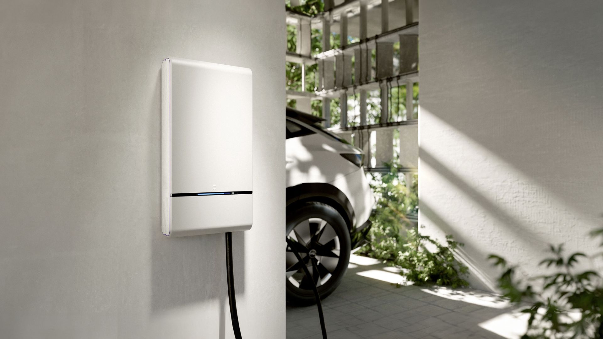 Voiture électrique en charge à une borne ; voiture blanche, câble de recharge branché, voyant bleu.