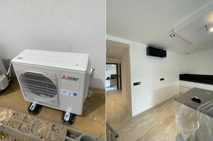 Unité extérieure de climatisation Mitsubishi et unité murale intérieure dans un espace récemment rénové.