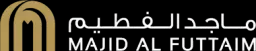 Majid Al Futtaim logo with Arabic text and gold arches on a black background.