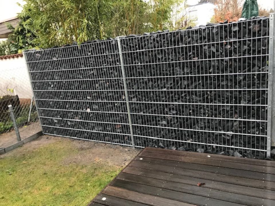 Gepflasterte Einfahrt, angelegt von ÖKo Gartenbau