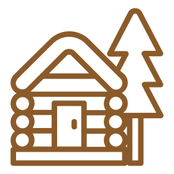 A log cabin with two trees in front of it.
