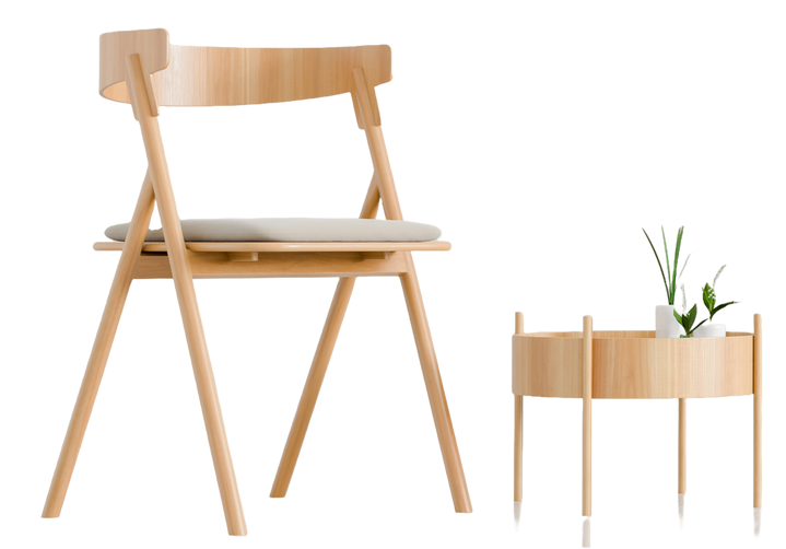 Une petite chaise avec un petit meuble de rangement