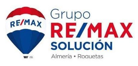 The logo for grupo re / max solución is a hot air balloon.