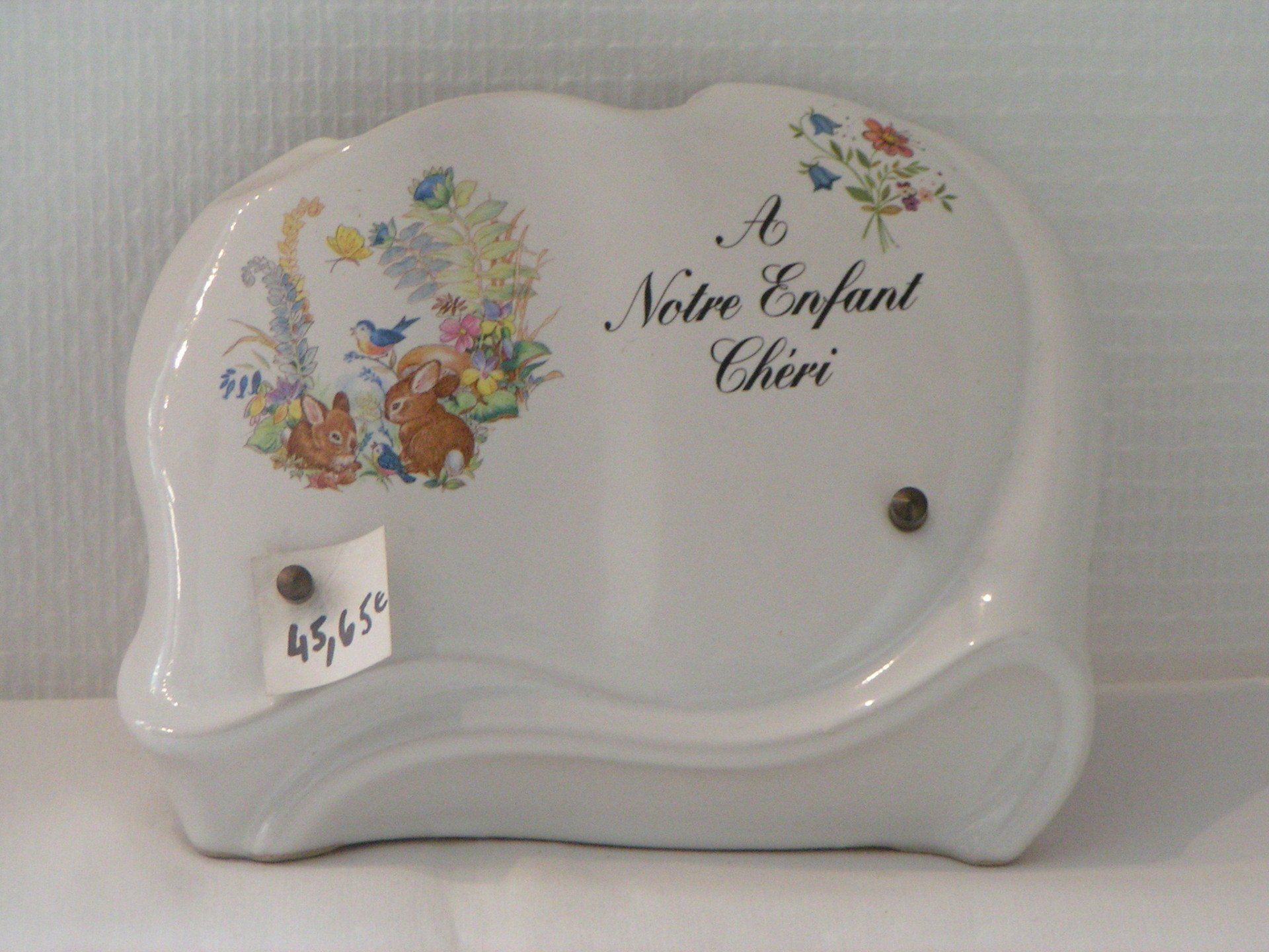 Plaque en porcelaine blanche