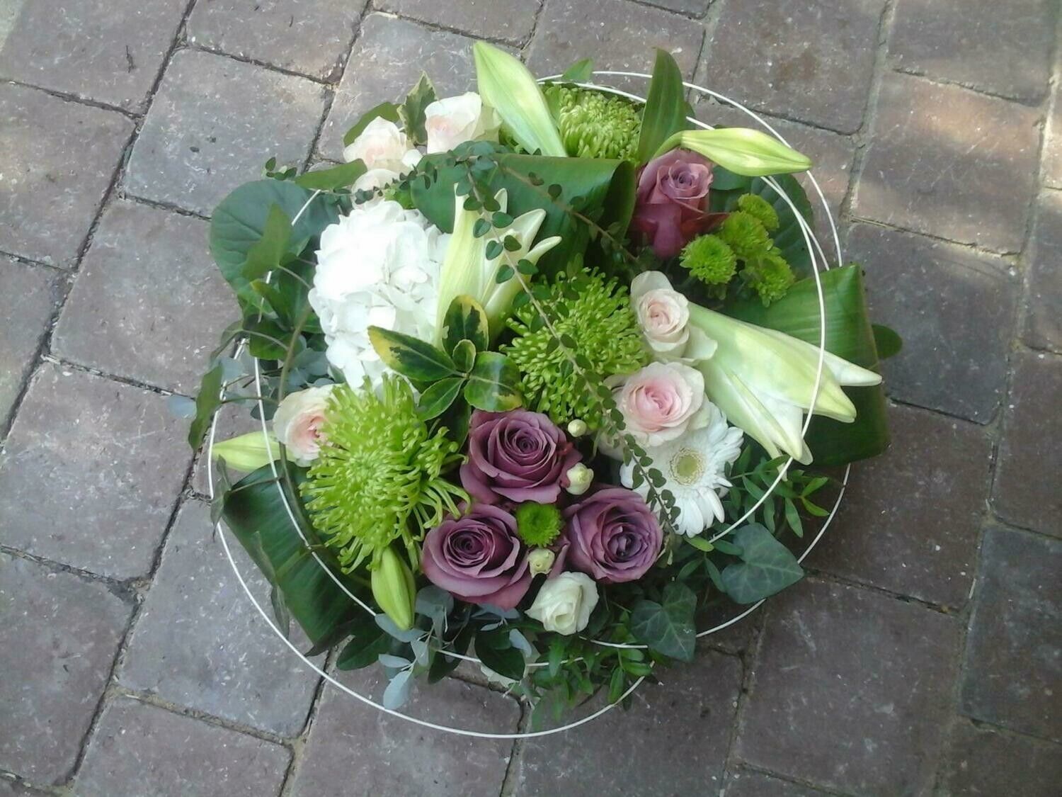 Composition florale - pouf rond